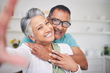 Image showing Selfie, face and old couple, love and memory with happiness, bonding and care with man and woman at home. Portrait, hug and smile in picture, social media post and happy people with photography