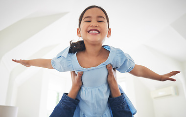 Image showing Airplane, game and portrait of girl child with father in a living room with love, bonding and having fun in their home. Flying, playing and face of happy kid with parent in a lounge with fantasy