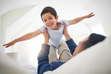 Image showing Airplane, portrait and boy child with father on a bed with love, bonding and having fun with game at home. Flying, playing and face of kid smile with parent in a bedroom with fantasy, plane or lift