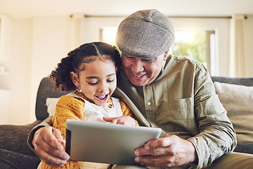 Image showing Young girl, grandfather and tablet, relax together and watch cartoon or e learning with games while at home. Bonding, love and spending quality time, old man and female child with gadget and internet