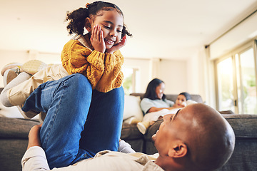 Image showing Happy father, girl and play in home living room, bonding and having fun together. Smile, dad and child on knee of parent, kid and family with care, love and enjoying quality time to relax in house.