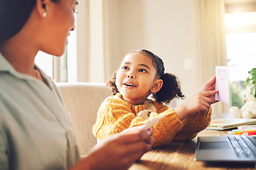 Image showing Mom, child and alphabet card for reading, spelling and learning for literature, language and studying in family home. Letter, mother and daughter with teaching, education and focus for development