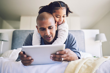 Image showing Girl, hug or father with tablet for streaming a movie to relax together and watch cartoon in family home. Affection, love or child with dad for quality bonding time with gadget on internet in bedroom
