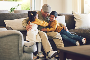 Image showing Hug, grandfather or happy kids on a sofa with love enjoying quality bonding time together in family home. Smile, affection or senior grandparent relaxing with young children siblings on house couch