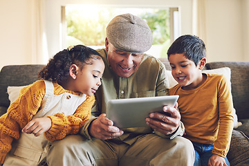 Image showing Young kids, grandfather and tablet, relax together and watch cartoon or e learning with games while at home. Bonding, love and spending quality time, old man and grandkids with gadget and internet