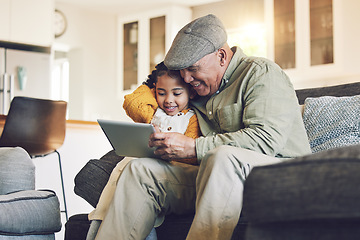 Image showing Girl kid, grandfather with tablet on sofa and relax together, watch cartoon or elearning games at home. Bonding, love and spending quality time, old man and female child with gadget and internet