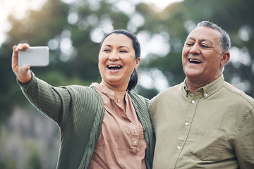 Image showing Happy senior couple, selfie and laughing for photo, picture or memory together in nature outdoors. Elderly man and woman smile for social media, online post or vlog in happiness for capture outside