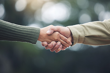 Image showing Shaking hands, senior man and people together in partnership, greeting or welcome with trust, bonding or moment in nature on blurred background. Handshake, support and solidarity with a person