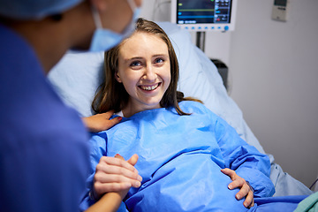 Image showing Pregnant woman, labor and hospital with holding hands, bed and support from nurse, excited smile and pain. Strong mother, midwife and helping hand in clinic for infant child, motivation and new life