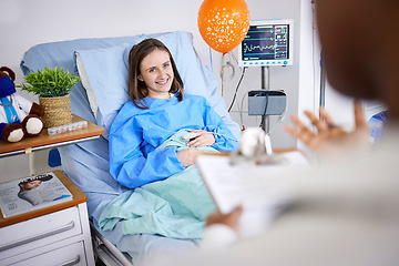 Image showing Healthcare, woman and patient with recovery, smile and consultation with good news, help and treatment. Female person, doctor and lady in a hospital bed, healing and diagnosis with procedure success