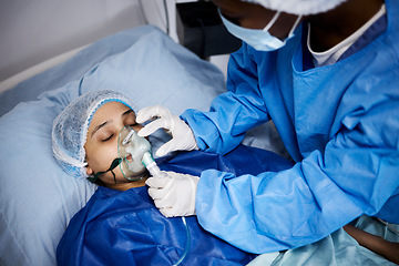 Image showing Doctor, hospital bed or woman with an oxygen mask, anesthesia or operation for healthcare recovery. Medical, ventilation or sick patient with breathing equipment in coma for respiratory in emergency