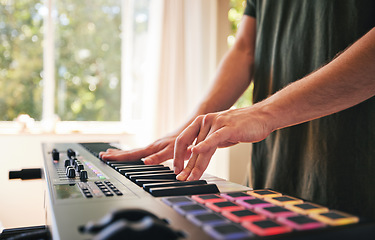 Image showing Hands, man and synthesizer piano for music, talent and skills in home studio. Closeup, musician and playing electrical keyboard for audio performance, sound artist and learning notes on instrument