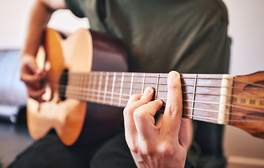 Image showing Hands, person and guitar for music, talent and skills in home studio. Closeup, musician and singer playing acoustic instrument for audio performance, artist and learning notes for sound production