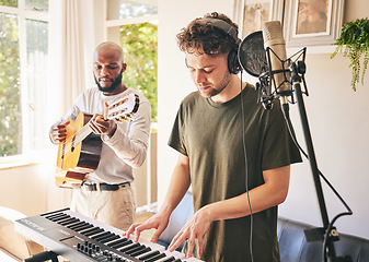 Image showing Piano, recording music and friends with guitar in home studio together. Electric keyboard, instrument and microphone of singer in collaboration for acoustic production with headphones of creative men