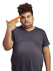 Image showing Plus size, carrot gun and man in portrait isolated on a transparent png background. Vegetables, carrots and sad person unhappy with diet, nutrition and vitamins, plants and food, health or wellness.