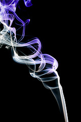 Image showing Abstract violet smoke. Isolated on a black background