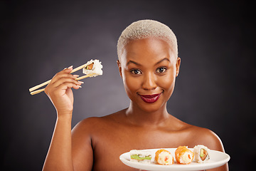 Image showing Sushi, Japanese food and portrait of woman with salmon, rice and chopsticks for eating a platter of fish, seafood or luxury. Healthy lunch or plate with dinner of sashimi from Asian restaurant