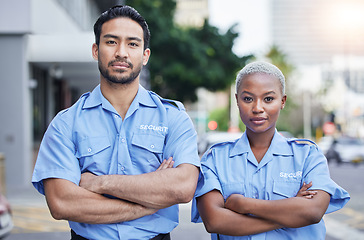 Image showing Woman, man and security guard portrait in street, arms crossed or serious with support, safety or teamwork. Protection agent, smile and face for partnership, solidarity and pride for job in metro cbd