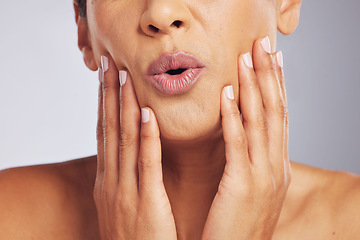 Image showing Lips, pouting or hands of a woman for skincare, beauty or dermatology wellness. Mouth, anti aging and face or manicure of a model for cosmetic nails, glow or wow isolated on a studio background