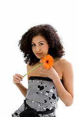 Image showing Young girl with flower