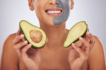 Image showing Woman, skincare, with avocado and face mask with charcoal, clay or natural beauty product for wellness, detox or nutrition. Fruit, healthy cosmetics and girl happy with green or vegan facial care