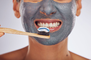 Image showing Beauty, face mask and teeth, woman and toothbrush with dental health and cosmetics isolated on white background. Facial, dermatology and oral care, female model with hygiene, grooming and skincare