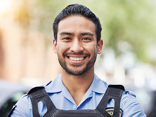 Image showing Portrait of man, security guard or smile of safety officer for protection service or patrol in city. Law enforcement, professional crime prevention or face of happy asian policeman in uniform outdoor