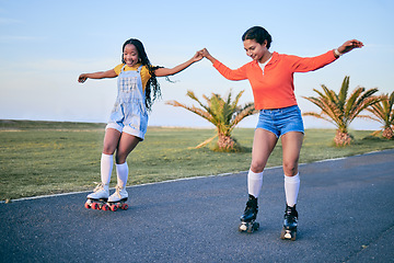 Image showing Holding hands, roller skates and friends on street for exercise, workout or training outdoor. Skating, happy people and girls together for sports on road to travel, journey and moving for fitness.