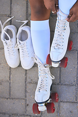 Image showing Above, skating and legs of a woman in the street for summer fun, a hobby and getting ready for a derby. Shoes, vintage and the feet of a girl or person playing with outdoor skates in the road