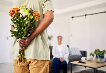 Image showing Flowers bouquet, elderly couple or surprise present for Valentines Day, romance or marriage celebration, care or bond. Home, special event or back of senior man hide floral gift to celebrate birthday