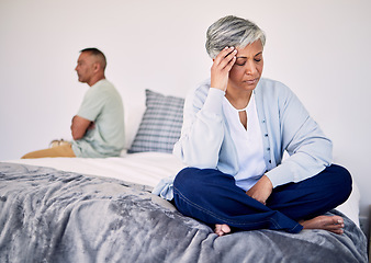 Image showing Angry, divorce and a senior couple in the bedroom for a fight, sad and depression in marriage. Stress, mental health and an elderly woman with anxiety about a problem with a man on a bed for conflict