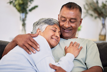 Image showing Retirement, love and care with mature couple on sofa to relax in family home for bond. Marriage, smile and senior man or woman in living room for rest or calm with happiness for relationship together