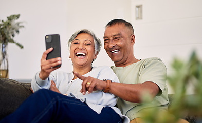 Image showing Love, phone and senior couple laughing at funny social media meme, online comic or streaming comedy video. Smartphone application, marriage humour and elderly people laugh at retirement joke at home