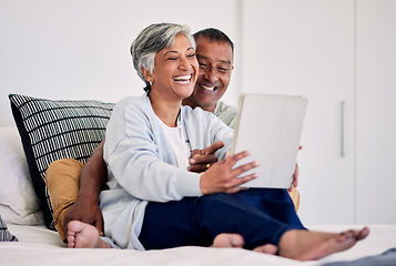 Image showing Happiness, bedroom tablet and elderly couple laughing at funny social media meme, comic or streaming comedy video. Funny morning news article, home bed and senior bonding people laugh at online joke