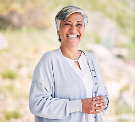 Image showing Portrait, happiness and senior woman with pride in outdoor on weekend in summer to relax. Motivation, smile and confident with elder female in nature for vacation or wellness with blurry background.