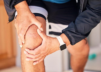 Image showing Fitness, injury closeup or hands on knee pain at gym after exercising, body training accident in workout. Emergency, broken bone or injured person suffering from muscle tendon after legs exercise