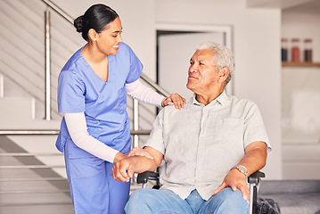 Image showing Happy woman, nurse and talking to patient in wheelchair for support, medical service and physical therapy in retirement home. Caregiver helping elderly person with disability, healthcare and nursing