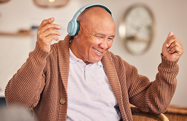 Image showing Music, headphones or happy old man listening to radio playlist to relax in house to enjoy retirement. Home, freedom or senior person dancing, smiling or streaming sound, song or audio on break alone