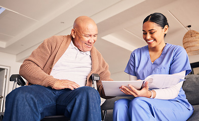 Image showing Old man, wheelchair or caregiver reading documents, history or healthcare documents at nursing home. Smile, medical records or happy nurse showing senior patient or elderly person with a disability