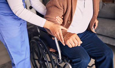 Image showing Hands, nurse and patient in wheelchair for support, medical service and physical therapy in retirement home. Closeup of caregiver helping elderly person with disability, healthcare and nursing aid