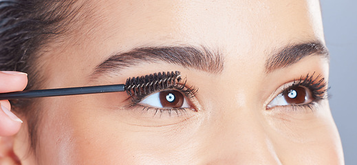 Image showing Mascara brush, beauty and eyes of woman with makeup application for eyelash extension, face treatment or natural cosmetics. Skincare closeup, cosmetology and person with self care morning routine