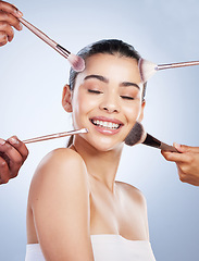 Image showing Makeup brush, makeover and hands on asian woman studio with cosmetic, tools or application on grey background. Face, transformation and lady model with beauty, glamour or contour cover results