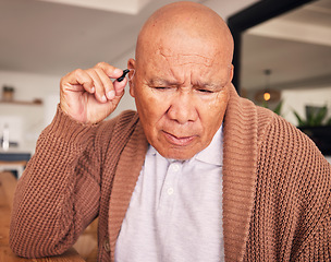 Image showing Senior man, hand and hearing aid for ears, health and wellness for retirement in nursing home. Elderly person with disability, audio or sound technology to listen, medical help or innovation at house