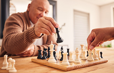 Image showing Senior man, home and chess for games, competition and focus with friends, strategy and problem solving. Elderly person, hands and board for contest with mindset, excited smile and moving at table