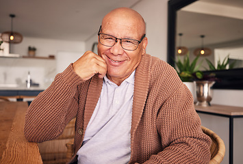 Image showing Portrait, smile and glasses with a senior man sitting in the living room of his home during old age retirement. Relax, wrinkles and satisfaction with a happy elderly male pensioner in his house