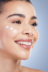 Image showing Skincare, beauty and happy woman with face cream application in studio for beauty, wellness or care on grey background. Sunscreen, smile and asian female model relax with luxury hydration facial mask