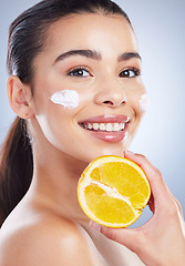 Image showing Lemon, skincare and woman portrait with face cream in studio for wellness or cosmetic mask on grey background. Fruit, smile and lady with dark spots facial, melasma or acne prevention or sunscreen