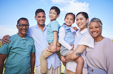 Image showing Big family, children and happy portrait on blue sky outdoor for fun, adventure and play on vacation. Young parents, grandparents and kids or Mexican people on nature holiday or at park with a smile