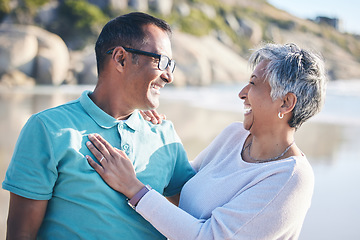 Image showing Beach, travel and senior couple laughing for bonding, quality time and relaxing in nature. Love, retirement and happy elderly man and woman by ocean on holiday, vacation and adventure in morning