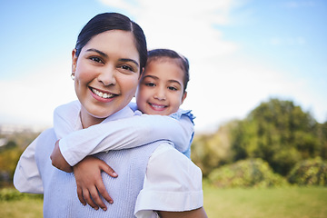 Image showing Happy mother, portrait and hug with child for quality time, bonding or love together in nature outdoors. Mom smile with daughter in piggyback enjoying summer weekend, holiday or vacation in the park